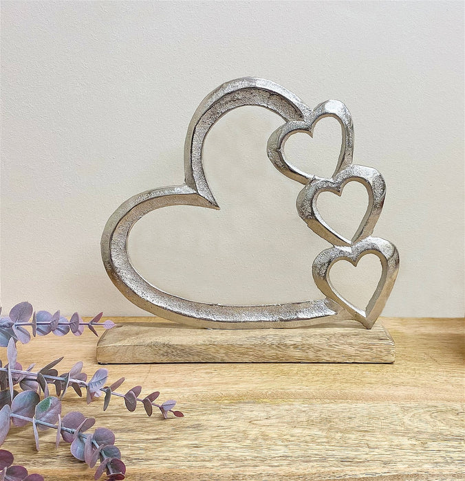 Metal | Four Heart Ornament On A Wooden Base