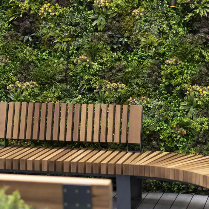 Elevate Your Space with On-Trend Artificial Green Walls and Black Panelling