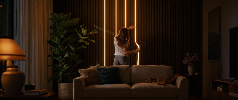 Acupanel® Glow LED light strips backlighting an acoustic slat wall panel