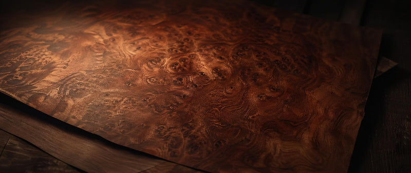 Burl wood veneer sheets with tightly figured grain in walnut and exotic species
