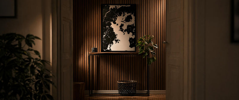 Acoustic slat wood wall panels installed on a feature wall in a styled living interior